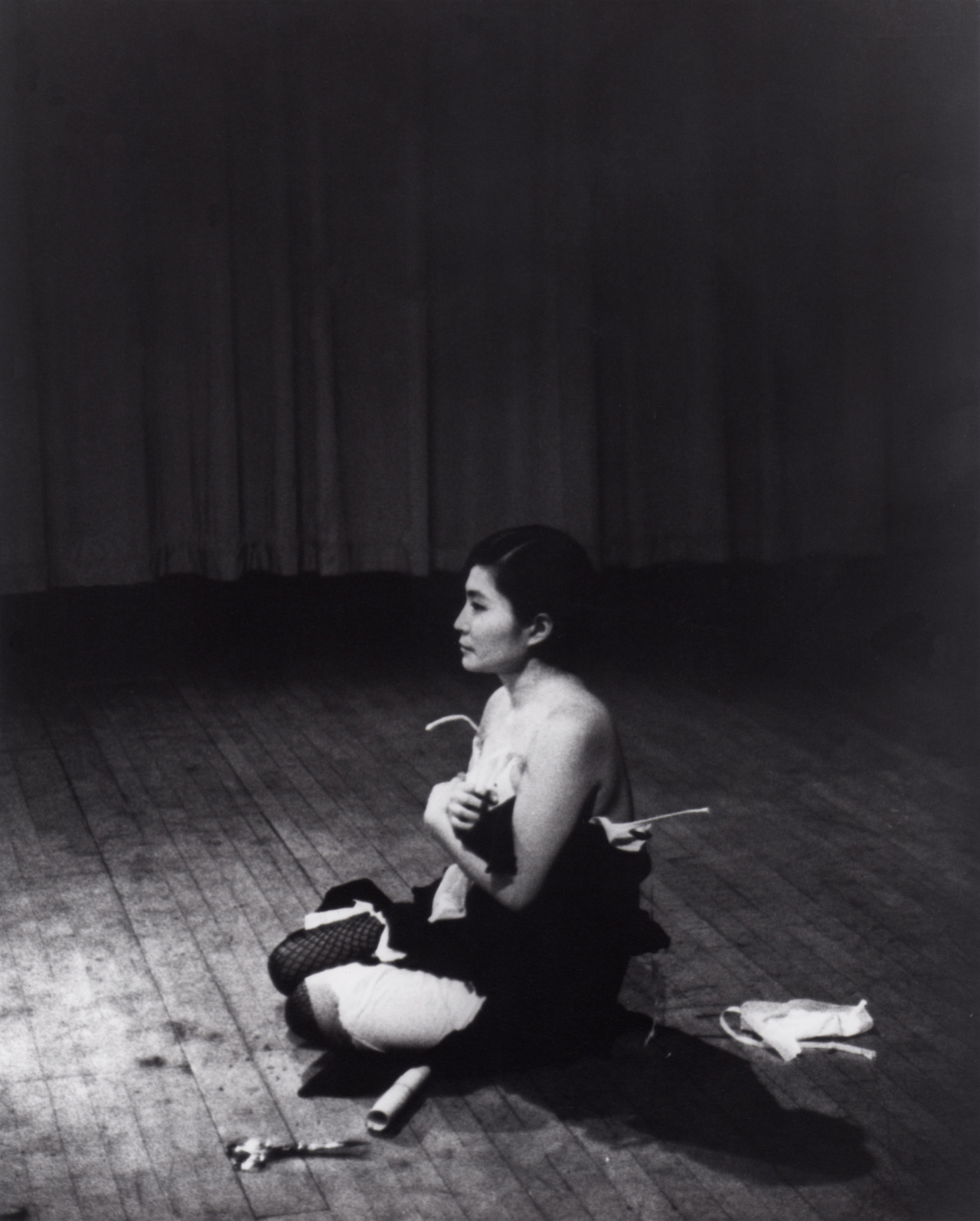 Cut Piece (1964) performed by Yoko Ono in New Works of Yoko Ono, Carnegie Recital Hall, New York, March 21, 1965. Photograph by Minoru Niizuma. © Minoru Niizuma. Courtesy Lenono Photo Archive, New York