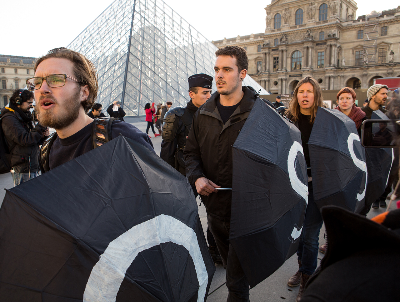 Protesters in front of the Louvre