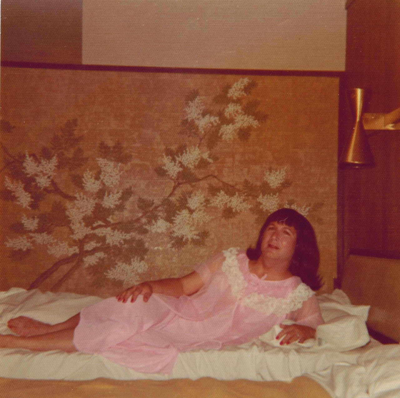 Alison Laing lying on a bed (Joseph A. Labadie Collection, University of Michigan and Digital Transgender Archive)
