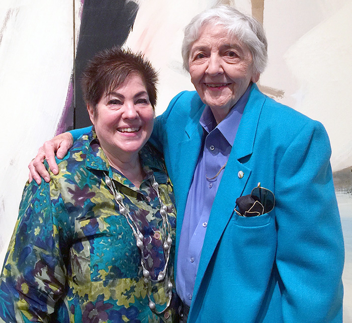 Curator Gwen Chanzit (left) and artist Betty Godwin.