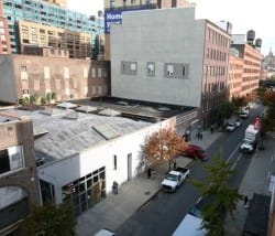 Dia will construct a new exhibition space on the footprint of a two-story building, center left, that it owns but rents out. (photo by Chester Higgins Jr./The New York Times)