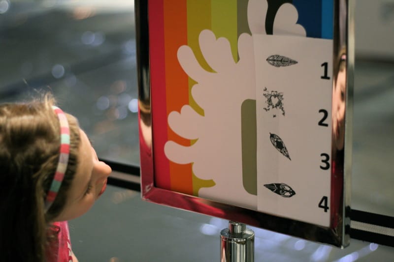 A young girl looks at the 1stfans sign during their launch event in January2 008