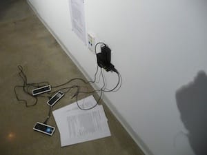 Cell phones with instructions on how to use the Transborder Immigrant Tool.