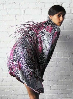 Gadani demonstrates her Porcupine Dress in action. Amisha Gadani's Skink Dress mimics a skink's ability to shed its tail when attacked. Image via http://amishagadani.com.