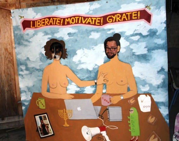 A visitor and a dog embody Chan and Mhann in the interactive painting "Chan & Mann's New Fantasy." All images courtesy Audrey Chan.