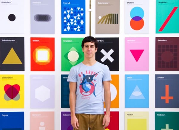 London artist Genis Carreras in front of his philosophy posters. Image via http://www.geniscarreras.com/about.html.