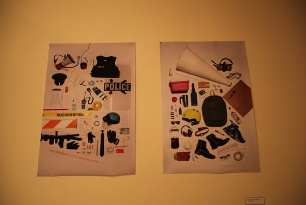 Police equipment poster and Chen's checklist for protesters