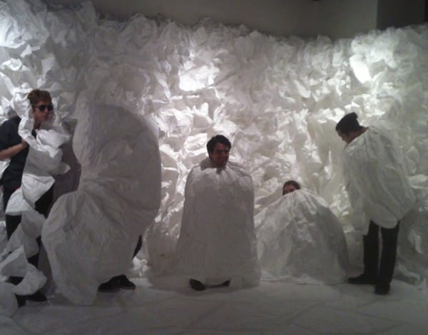 Visitors wrap themselves in Tyvek at the Pacific Design Center. Image courtesy Post Modern Production.