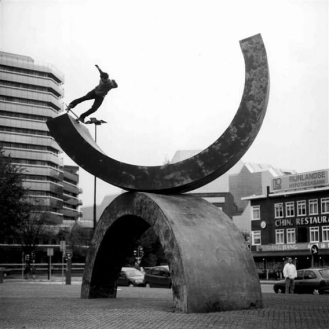 Skateboarding on modernist sculpture