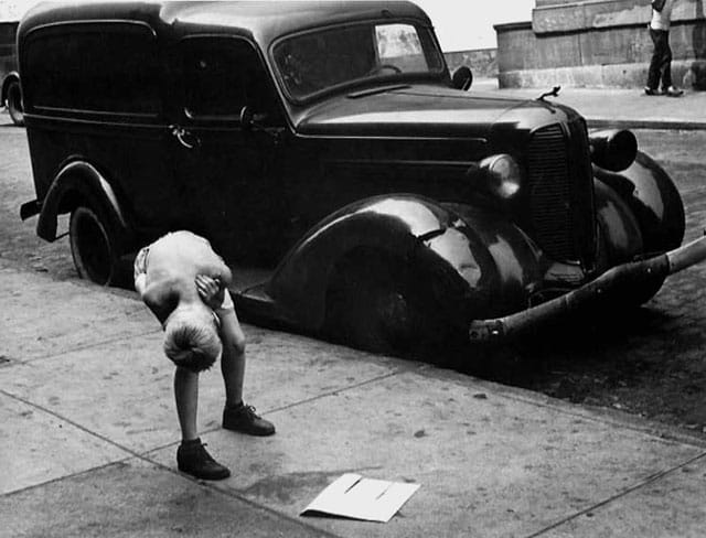 Helen Levitt, "NYC (Boy Bending by Car)"