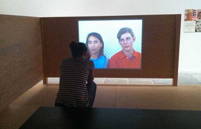 A viewer watches another video by Hayes, "We Knew We Would Go to Jail" 