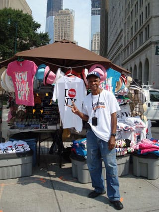 Street vendor with Stop-and-Frisk T-shirt