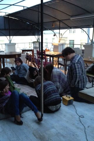 Students reading "The Master and Margarita" on the tsiferblat roof