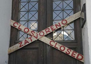 Wooden boards saying "closed" were mounted across the entrance to the National Museum of Bosnia and Herzegovina.