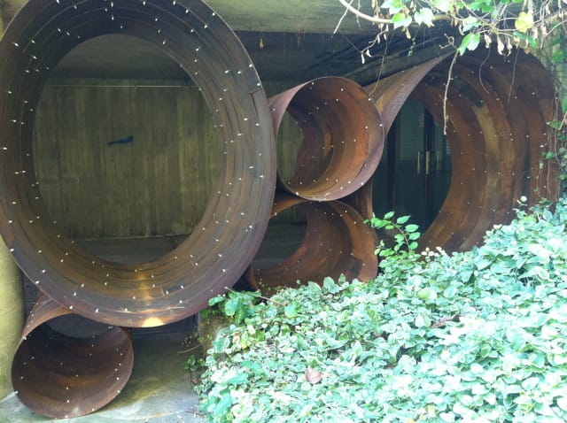 Work by Dewitt Godfrey installed outside at Lehman College