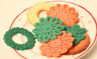Ralf Holleis's printed Christmas cookies (Screenshot by Hyperallergic)