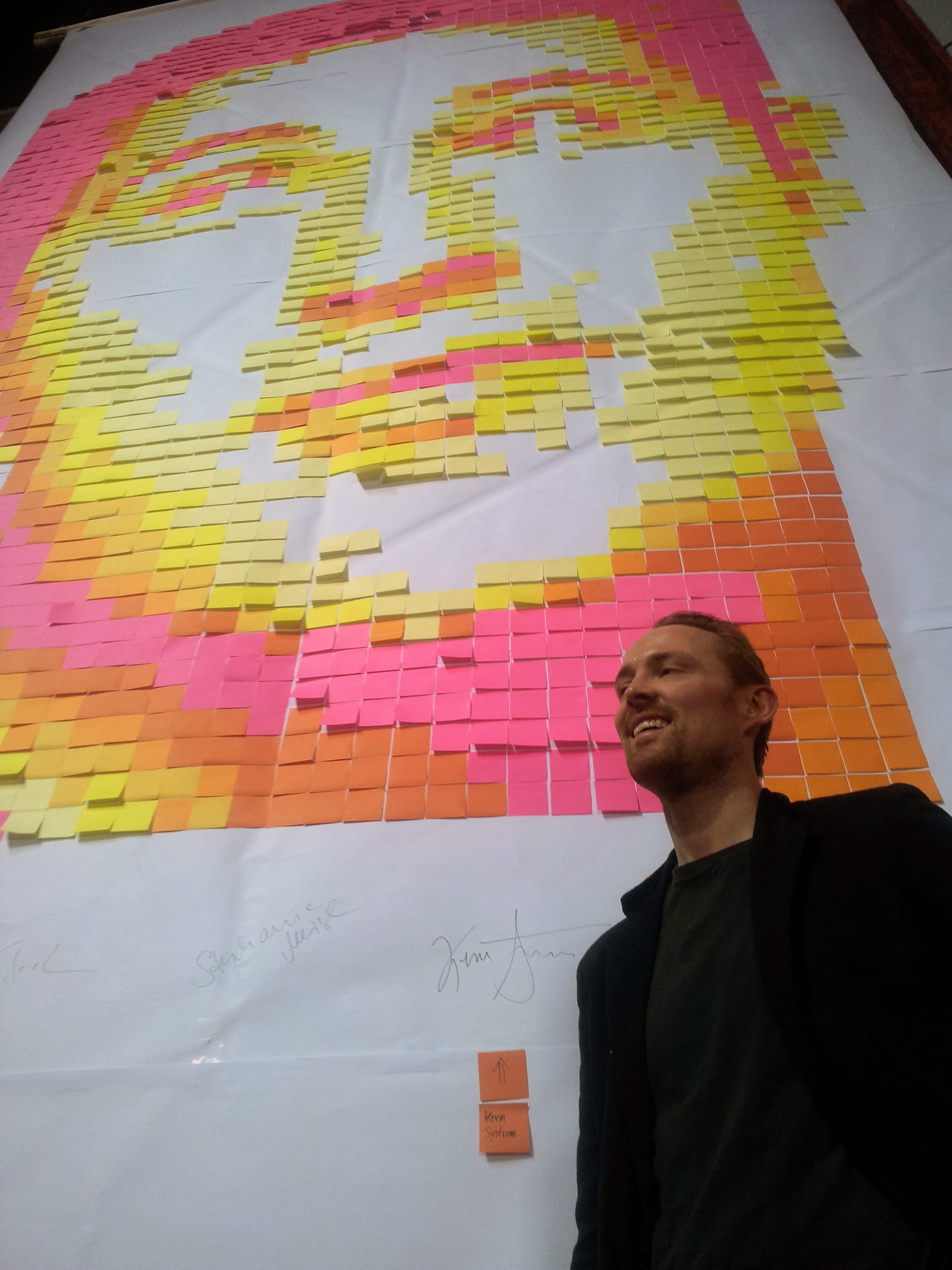 Andreas Kopp with his portrait of Instagram founder Kevin Systrom (Photo by author)