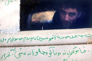 A photo from Enri Canaj's "Trapped" series (click to enlarge) (image via enricanaj.com)