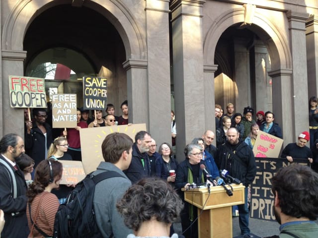Cooper Union art professor Day Gleeson speaking at a press conference in December