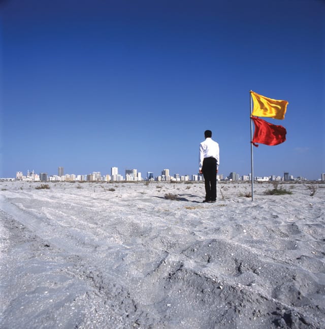 Mohammed Kazem, "Photographs with Flags" (1997-2003) (Image courtesy the Guggenheim)