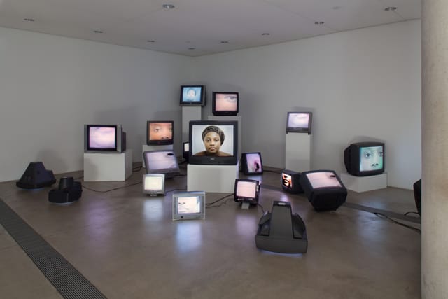 Zina Saro-Wiwa. "Mourning Class: Nollywood" (2010), video installation on monitors, color, sound, 20 min 42 sec. (courtesy and © 2012 Zina Saro-Wiwa, photograph by Sam Fentress, all images via theprogressoflove.com)