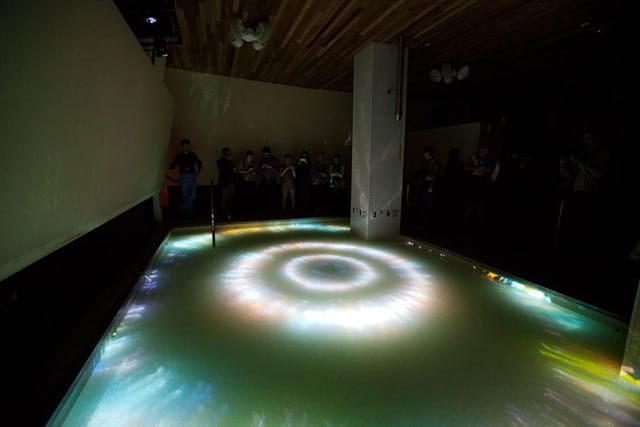 A view of Marco Brambilla's "Materialization/De-materialization" (2013) projected on the Grace Hotel pool. (photo by Ka-Man Tse for @TSqArts)