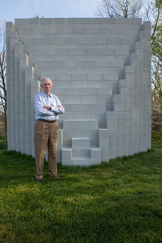 Al Shands beside a work by Sol Lewitt on the grounds of his estate outside Louisville, Kentucky. (photo by Ross Gordon)