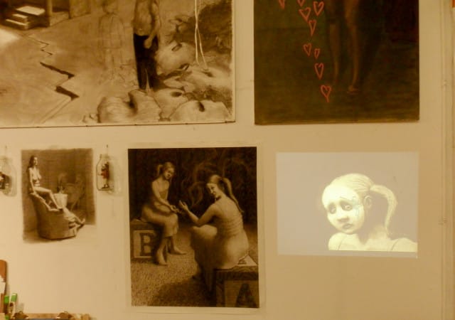 Wall of Sherry Di Filippo's studio, including charcoal drawing Baby A, Baby B