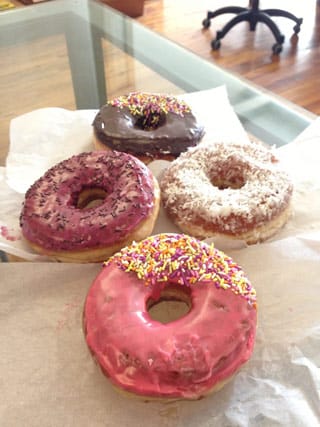 Four kinds of Kenny Scharf Doughnut Plant donuts (click to enlarge) (all photos by Hrag Vartanian for Hyperallergic)