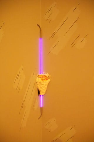 Aay Preston-Myint, detail of "Untitled (At Night, I Think of U)" (2013), neon lights, plastic laminate, vinyl tile, plaster, paint, cake, human hair, gelatin, metallic pigments, fragrance, nail polish, dimensions variable (click to enlarge)