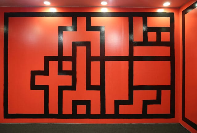 G.T. Pellizzi, “The Red and the Black” (2013), installation view, oil-based enamel on plywood (click to enlarge)