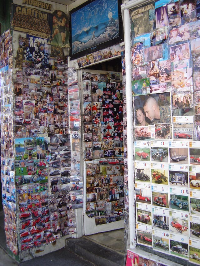 Melbourne barber Vittorio has adorned every wall in his shop with self-shots, or selfies. (all photographs by the author for Hyperallergic)