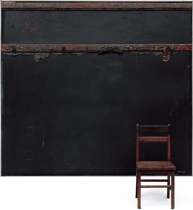 Llyn Foulkes, "In Memory of St. Vincent School" (1960), oil, charred wood, and plasticized ashes on blackboard; chair; blackboard: 66 x 72 1/4 in, chair: 26 1/4 x 13 x 12 1/2 in (courtesy Norton Simon Museum)