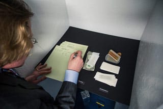 Keats working at the Quantum Bank (click to enlarge)