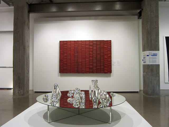 Theaster Gates, "Reflections on El Lissitsky" (2013), decommissioned fire hose & wood; Josiah McElheny, "Landscape Model for Total Reflective Abstraction (V)" (2004), mirrored glass table with hand blown mirrored glass objects