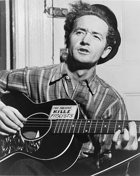 Woody Guthrie (photograph by Al Aumuller, courtesy Library of Congress)