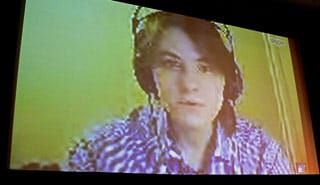 Yekaterina Samutsevich Skypes with a premiere audience "Pussy Riot: A Punk Prayer" (click to enlarge) (photo by the author for Hyperallergic)