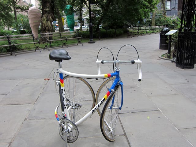 Alicja Kwade, "Journey without Arrival (Raleigh)" (2012/2013), stainless steel, aluminum, rubber, plastic components found materials distorted. dismantled and reassembled bicyle with bent pieces into a circle