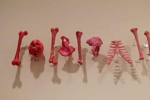 A side room contains a fragile installation by Beijing artist Lin Tianmiao, featuring a tidy array of synthetic human skeletons covered in silk thread. Each thread dangles off the bone and pools into a puddle of color on the floor. (It was impossible for me to get the piece into a single frame.)