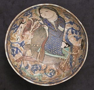 Bowl (12th–13th century), from Iran, Rayy, stonepaste, polychrome in-glaze and overglaze painted and gilded on an opaque white glaze (mina'i), 3 1/2 x 8 1/4 in (via metmuseum.org)