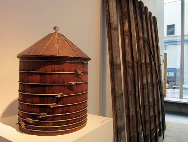 A model of a water tank and lumber from a water tower from Isseks Bros Inc.