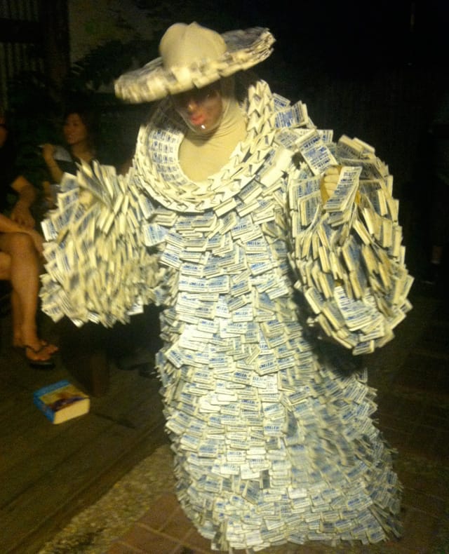 Sylvia Dean and Me enters the backyard.