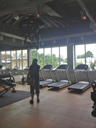 Virginie Barré's "Fat Bat" hovers above the 21c Museum Hotel gym