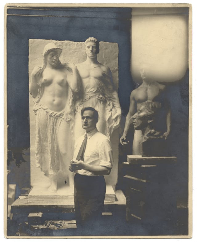 James Earle Fraser in his studio with his sculptures (ca. 1920) (via Smithsonian Institution)