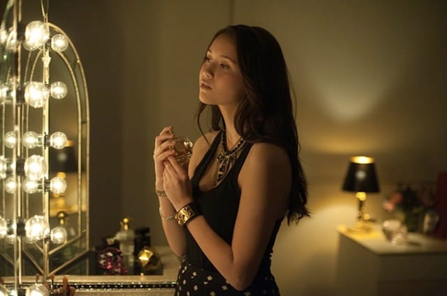 Rebecca An sprays herself with Lindsay Lohan's perfume in "The Bling Ring" (2013)