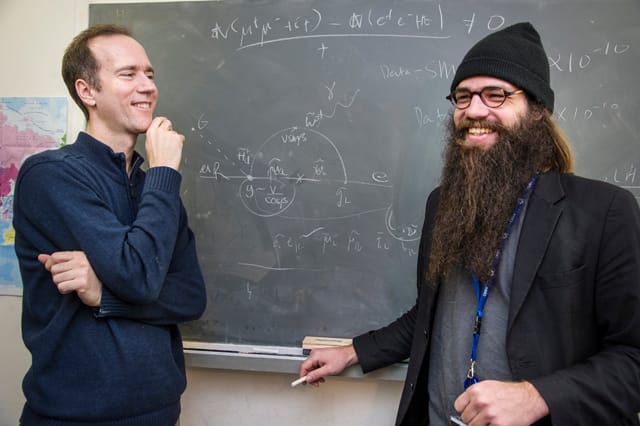 Julius Von Bismarck, CERN's first artist in Residence, with Physicist James Wells (photograph by Maxilimilen Brice, © 2012 CERN)