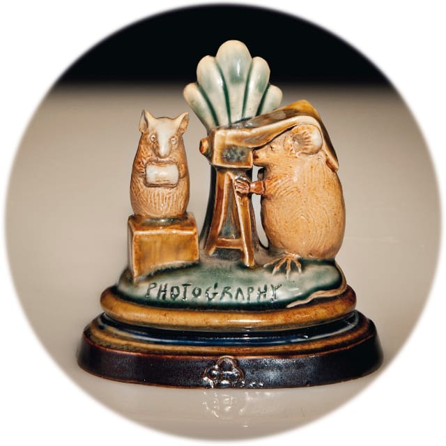 "Photography," a George Tinworth Doulton Lambeth Stoneware "Mouse" Group Menu Holder (1886), showing a young mouse having his photograph taken