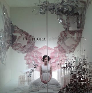 Lia Chavez meditating at Soapbox Gallery (via soapboxgallery.org)