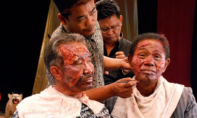 Film still from "The Act of Killing" (via Drafthouse Films on Flickr)