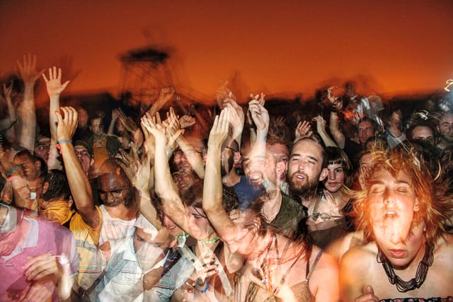 Crowd dancing on a rooftop during a Fourth of July party, Bushwick, Brooklyn, 2006